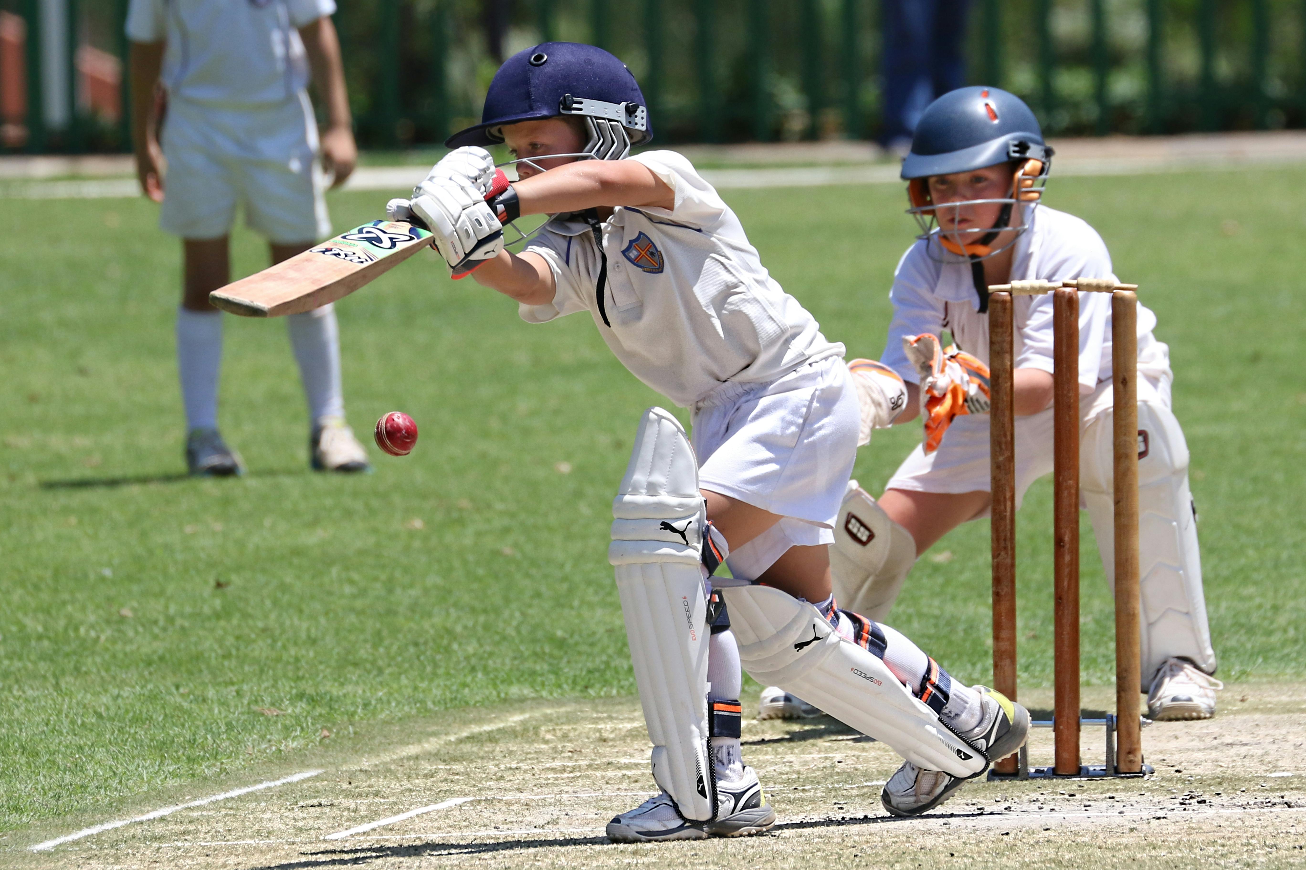Kids playing cricket